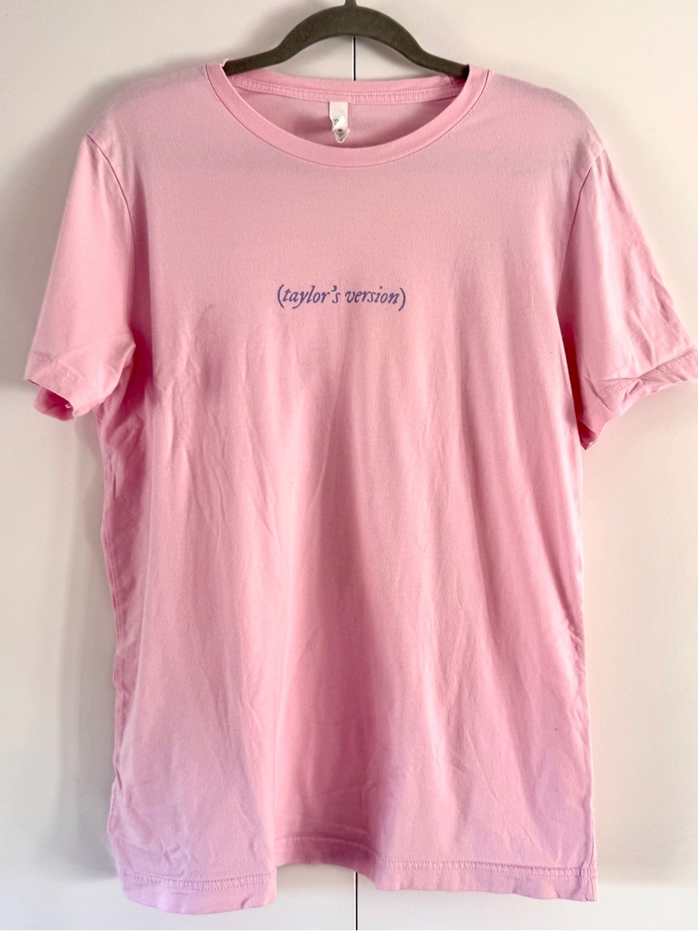 Taylor Swift Taylor’s Version Pink Short Sleeve Tee with Lavende Folklore script